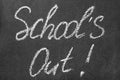 Text School`s Out written on chalkboard. Summer holidays