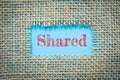 Text Shared on paper blue has Cotton yarn background you can apply to your product.