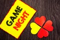 Text showing Game Night. Business photo showcasing Entertainment Fun Play Time Event For Gaming written on Sticky Note Paper with Royalty Free Stock Photo