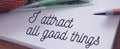 Text showing I Attract All Good Things and 100 Euro banknotes Positive attraction law Motivation Affirmation Concept Royalty Free Stock Photo