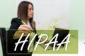 Hand writing sign Hipaa. Business idea Acronym stands for Health Insurance Portability Accountability