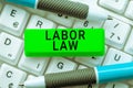 Text showing inspiration Labor Law. Business showcase rules relating to rights and responsibilities of workers Royalty Free Stock Photo
