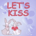 Text showing inspiration LETS KISS. Business concept Sign of love expressing emotions between couple Bunnies with heart