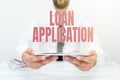 Text sign showing Loan Application. Business idea Document that provides financial information about borrower Presenting