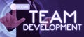 Handwriting text Team Developmentlearn why and how small groups change over time with graphs. Business concept learn why Royalty Free Stock Photo