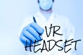 Hand writing sign Vr Headset. Business concept headmounted device that provides virtual reality for the wearer Scientist