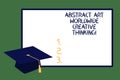 Text sign showing Abstract Art Worldwide Creative Thinking. Conceptual photo Modern inspiration artistically Graduation cap with