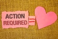 Text sign showing Action Required. Conceptual photo Important Act Needed Immediate Quick Important Task Text pink torn note equals