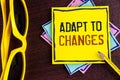 Text sign showing Adapt To Changes. Conceptual photo Innovative changes adaption with technological evolution written on Yellow St Royalty Free Stock Photo