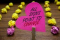 Text sign showing All Signs Point To Change. Conceptual photo Necessity of doing things differently new vision Paperclip hold pink Royalty Free Stock Photo