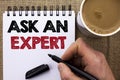 Text sign showing Ask An Expert. Conceptual photo Consult a Professional Asking for Advice Make a Question written by Man Holding Royalty Free Stock Photo