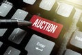 Text sign showing Auction. Business showcase Public sale Goods or Property sold to highest bidder Purchase Typing Old