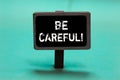 Text sign showing Be Careful. Conceptual photo making sure of avoiding potential danger mishap or harm Blackboard green background