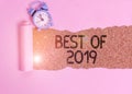 Text sign showing Best Of 2019. Conceptual photo great and marvelous things and events happened on 2019 Alarm clock and torn