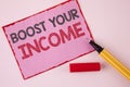 Text sign showing Boost Your Income. Conceptual photo improve your payment Freelancing Part time job Improve written on Pink Stick Royalty Free Stock Photo