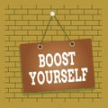 Text sign showing Boost Yourself. Conceptual photo to make yourelf feel more positive or more confident Colored memo