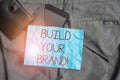 Text sign showing Build Your Brand. Conceptual photo creates or improves customers knowledge and opinions of product Royalty Free Stock Photo