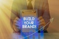 Text sign showing Build Your Brand. Conceptual photo creates or improves customers knowledge and opinions of product. Royalty Free Stock Photo