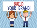 Text sign showing Build Your Brand. Conceptual photo creates or improves customers knowledge and opinions of product Two Royalty Free Stock Photo