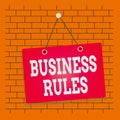 Text sign showing Business Rules. Conceptual photo a specific directive that constrains or defines a business Colored