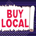 Text sign showing Buy Local. Concept meaning Patronizing products that is originaly made originaly or native