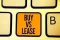 Text sign showing Buy Vs Lease. Conceptual photo Own something versus borrow it Advantages Disadvantages Keyboard orange key Inten