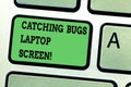 Text sign showing Catching Bugs Laptop Screen. Conceptual photo Computer system protection safety antivirus Keyboard key