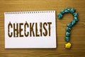 Text sign showing Checklist. Conceptual photo Todolist List Plan Choice Report Feedback Data Questionnaire written on Notebook Boo