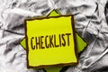 Text sign showing Checklist. Conceptual photo Todolist List Plan Choice Report Feedback Data Questionnaire written on Stacked Stic