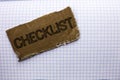 Text sign showing Checklist. Conceptual photo Todolist List Plan Choice Report Feedback Data Questionnaire written on tear Cardboa