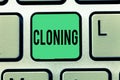 Text sign showing Cloning. Conceptual photo Make identical copies of someone or something Creating clones