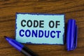Text sign showing Code Of Conduct. Conceptual photo Follow principles and standards for business integrity written on Sticky Note Royalty Free Stock Photo