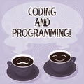 Text sign showing Coding And Programming. Conceptual photo Design and build an executable computer program Sets of Cup Royalty Free Stock Photo