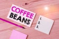 Text sign showing Coffee Beans. Conceptual photo pit inside the red or purple fruit often referred as a cherry Colored clothespin Royalty Free Stock Photo