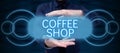 Text sign showing Coffee Shop. Business idea small informal restaurant serving coffee and light refreshments