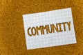 Text sign showing Community. Conceptual photo Neighborhood Association State Affiliation Alliance Unity Group Cork background note