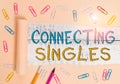 Text sign showing Connecting Singles. Conceptual photo online dating site for singles with no hidden fees Stationary and torn