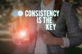 Text sign showing Consistency Is The Key. Conceptual photo full Dedication to a Task a habit forming process Woman wear