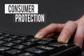 Text sign showing Consumer Protection. Internet Concept regulation that aim to protect the rights of consumers Hands Royalty Free Stock Photo