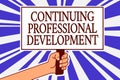 Text sign showing Continuing Professional Development. Conceptual photo tracking and documenting knowledge Man hand holding poster Royalty Free Stock Photo