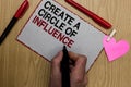 Text sign showing Create A Circle Of Influence. Conceptual photo Be an influencer leader motivate other people Written sticky note Royalty Free Stock Photo