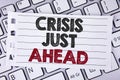 Text sign showing Crisis Just Ahead. Conceptual photo Foresee failure take right action before it is late written on Notebook pape