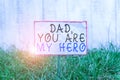 Text sign showing Dad You Are My Hero. Conceptual photo Admiration for your father love feelings compliment Crumpled Royalty Free Stock Photo