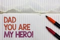 Text sign showing Dad You Are My Hero. Conceptual photo Admiration for your father love feelings compliment White torn page writte Royalty Free Stock Photo