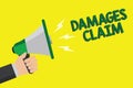 Text sign showing Damages Claim. Conceptual photo Demand Compensation Litigate Insurance File Suit Man holding megaphone loudspeak Royalty Free Stock Photo