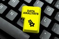 Text sign showing Data Analysts. Business showcase Programmer Design and Create Report Identifies patterns Typing Online Royalty Free Stock Photo
