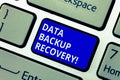 Text sign showing Data Backup Recovery. Conceptual photo the process of backing up data in case of a loss Keyboard key
