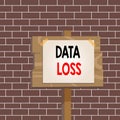 Text sign showing Data Loss. Conceptual photo process or event that results in data being corrupted and deleted Wood