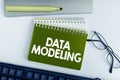 Writing displaying text Data Modeling. Internet Concept process of transferring data between data storage systems Royalty Free Stock Photo