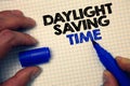 Text sign showing Daylight Sayving Time. Conceptual photo advancing clocks during summer to save electricity Graph paper grey impo